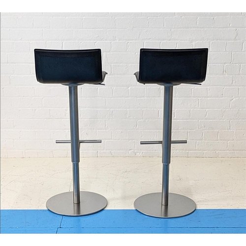 499 - LAPALMA THIN STOOLS, a pair, by Karri Monni, in black saddle leather, 95cm H x 37cm W x 40cm D, toge... 