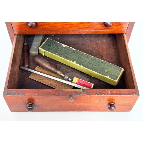 127 - CLOCKMAKERS CABINET, 19th century mahogany with six graduated drawers, (retaining a selection of clo... 