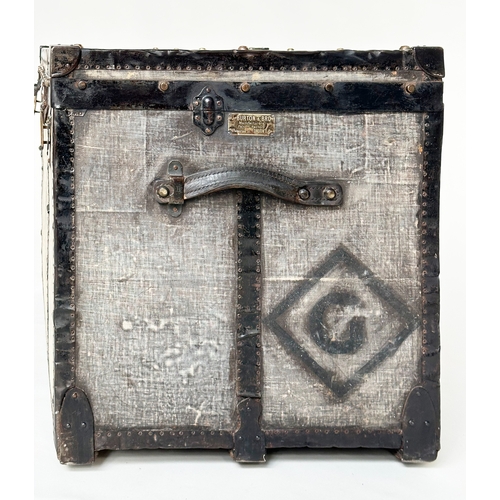 131 - TRAVELLING TRUNK BY J BURTON AND BRO LONDON, early 20th century canvas lined and metal bound with ri... 