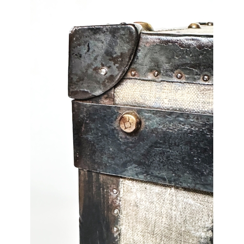 131 - TRAVELLING TRUNK BY J BURTON AND BRO LONDON, early 20th century canvas lined and metal bound with ri... 