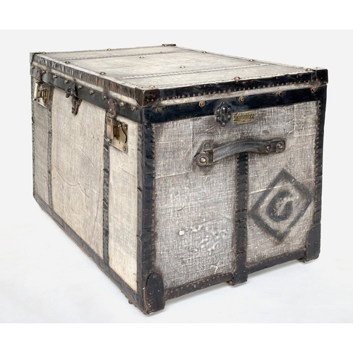 131 - TRAVELLING TRUNK BY J BURTON AND BRO LONDON, early 20th century canvas lined and metal bound with ri... 