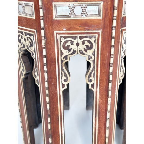 137 - SYRIAN TABLE, early 20th century octagonal bone, mother of pearl and ebony inset, 47cm W x 67cm H.