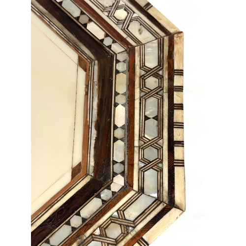 137 - SYRIAN TABLE, early 20th century octagonal bone, mother of pearl and ebony inset, 47cm W x 67cm H.