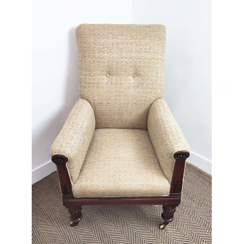 147 - LIBRARY ARMCHAIR, William IV mahogany, circa 1830, in patterned upholstery on brass castors, 111cm H... 