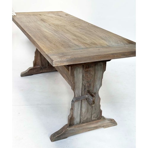 179 - REFECTORY DINING TABLE, farmhouse solid elm with twin trestle supports united by a shaped stretcher,... 