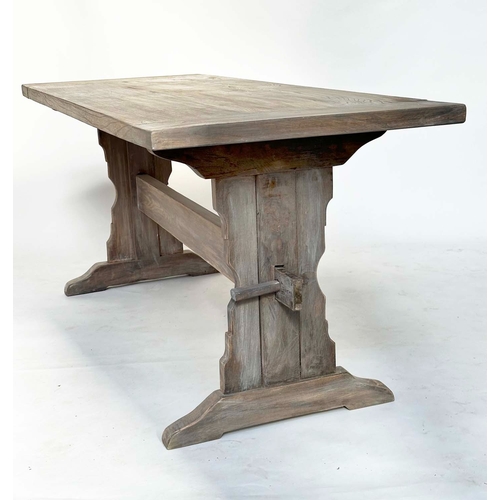 179 - REFECTORY DINING TABLE, farmhouse solid elm with twin trestle supports united by a shaped stretcher,... 