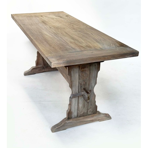 179 - REFECTORY DINING TABLE, farmhouse solid elm with twin trestle supports united by a shaped stretcher,... 