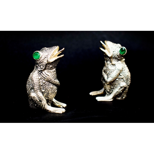 20 - A PAIR OF FROG FIGURAL SALT AND PEPPER POTS, silver plated.