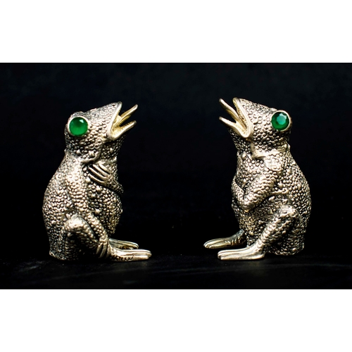 20 - A PAIR OF FROG FIGURAL SALT AND PEPPER POTS, silver plated.