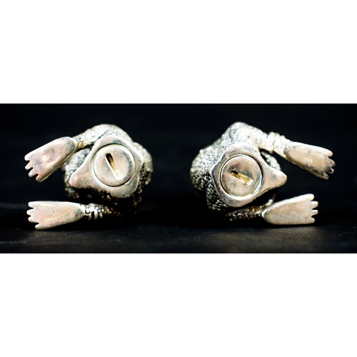 20 - A PAIR OF FROG FIGURAL SALT AND PEPPER POTS, silver plated.