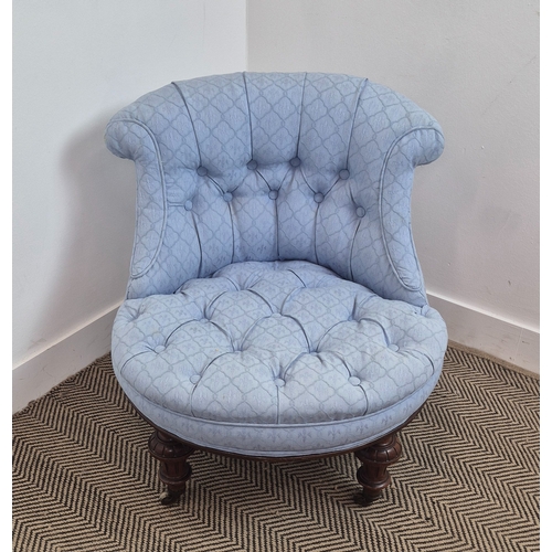 229 - A VICTORIAN WALNUT NURSING CHAIR, circa 1880, deep buttoned blue upholstered seat and back, turned f... 