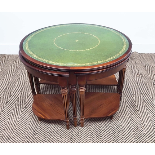 299 - NEST OF TABLES, yewwood with circular green leather and inset glass top above four quadrant tables, ... 