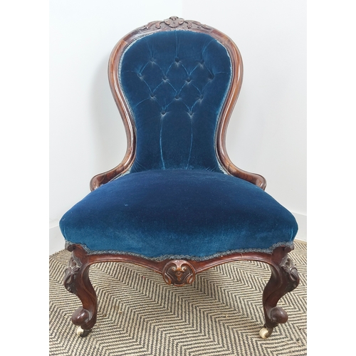 397 - MID VICTORIAN ROSEWOOD NURSING CHAIR, carved crest rail, deep buttoned back, sprung seat, front cabr... 