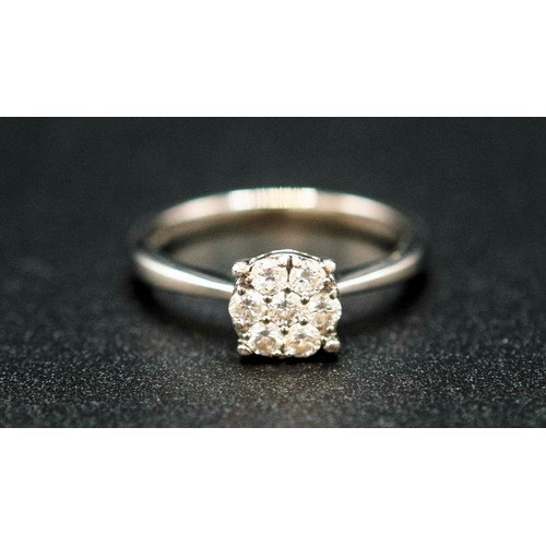 34 - 9CT WHITE GOLD DIAMOND CLUSTER RING. RBC diamonds 0.30ct approx.