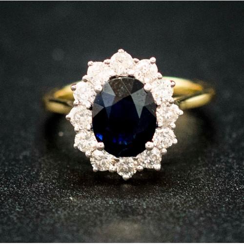 45 - 18CT YELLOW AND WHITE GOLD OVAL SAPPHIRE AND RBC DIAMOND CLUSTER RING. Sapphire 3.03ct. Diamonds 0.8... 