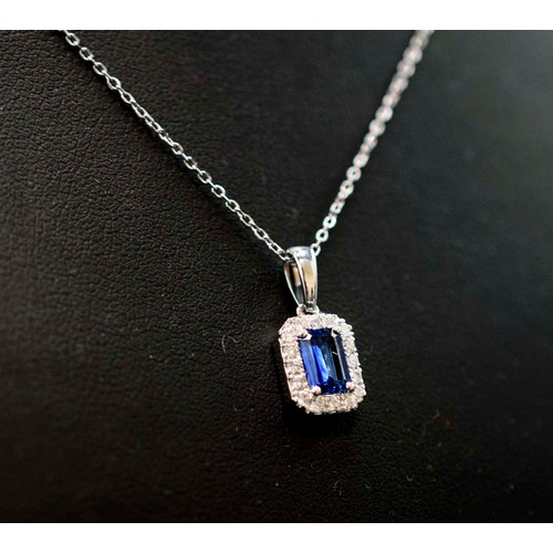 46 - 18CT WHITE GOLD STEP-CUT SAPPHIRE AND RBC DIAMOND CLUSTER PENDANT ON AN 18CT WHITE GOLD CHAIN, boxed... 