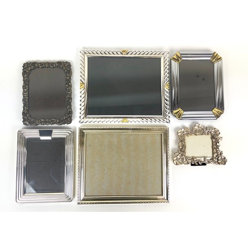 12 - PICTURE FRAMES, six, including a foliate Gorham frame and two Loui Mitchel frames. (6)