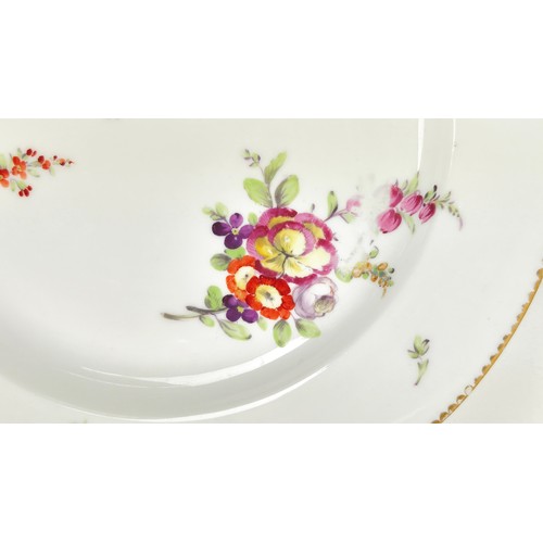 13 - MEISSEN PLATES, a set of eight, shaped edge with gilt rim and foliate sprig decoration. (8)