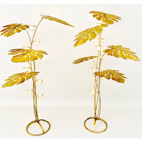 378 - OVERSIZED CANDELABRA, a set of two, tropical foliate design, 83cm x 62cm x 56cm. (2)