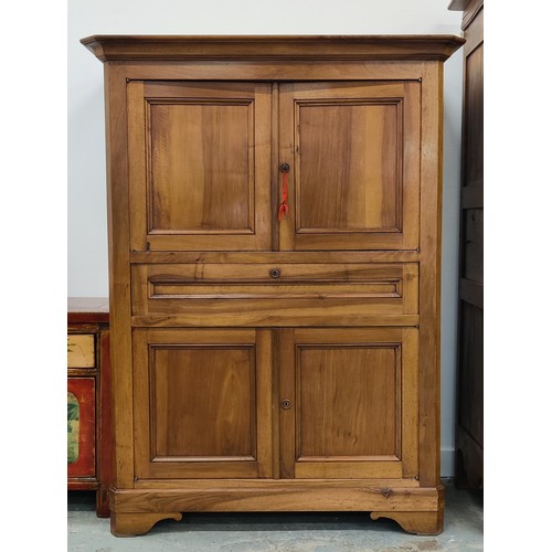 528 - CABINET, 19th century French fruitwood with two pairs of panelled doors and drop front compartment, ... 