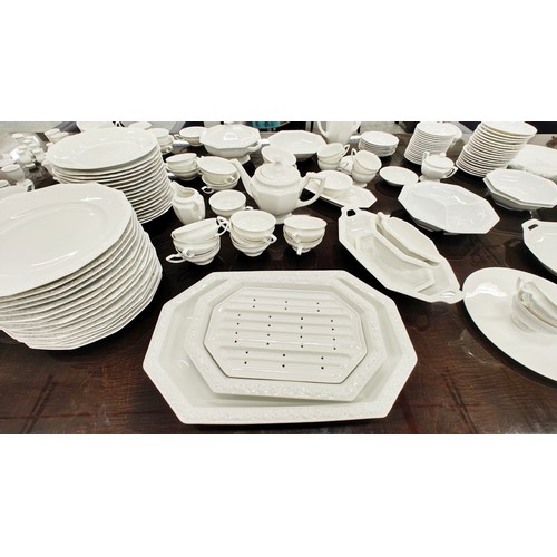 27 - A ROSENTHAL 'MARIA' WHITE DINNER AND TEA SERVICE, comprising, dinner plates, side plates, soup cups ... 