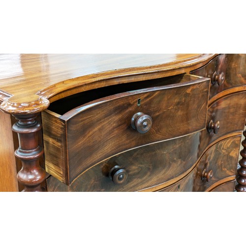 497 - SERPENTINE CHEST, Victorian mahogany, circa 1860, with five drawers between turned columns, 118cm H ... 