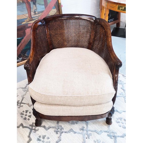 283 - BERGERES, a pair, Georgian revival burr walnut and double caned with taupe fabric seat cushions, 82c... 