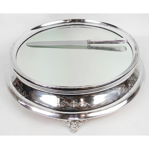 23 - A SILVER PLATED CAKE STAND, early 20th century, in carrying case, cake stand, 13cm H x 44cm diam.