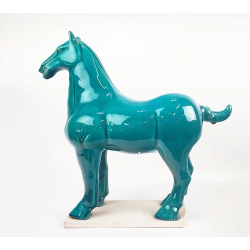 1 - TANG STYLE POTTERY HORSES, a pair, with a turquoise glaze, 50cm L x 51cm H. (2)