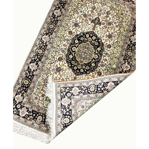 113 - EXTREMELY FINE PURE SILK HEREKE DESIGN RUG, 135cm x 80cm.