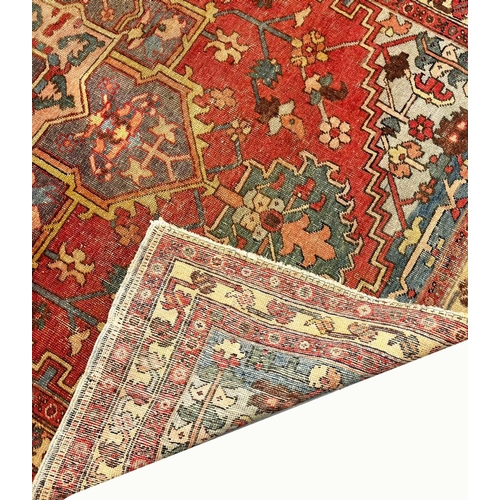 118 - ANTIQUE HERIZ RUG, 212cm x 138cm.