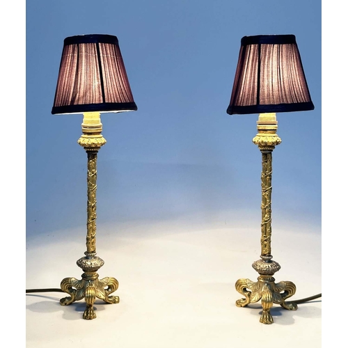 127 - ORMOLU TABLE LAMPS, an early 20th century pair, with triform supports and pleated silk shades, 43cm ... 