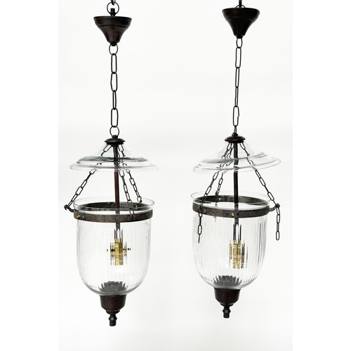 130 - BELL JAR HALL LANTERNS, a pair, with reeded glass jars and bronze style mounts, 64cm H. (2)