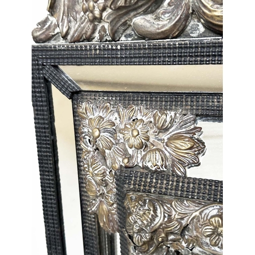 137 - DUTCH REPOUSSÉ WALL MIRROR, 19th century Dutch ebony moulded frame and silvered repoussé panels with... 