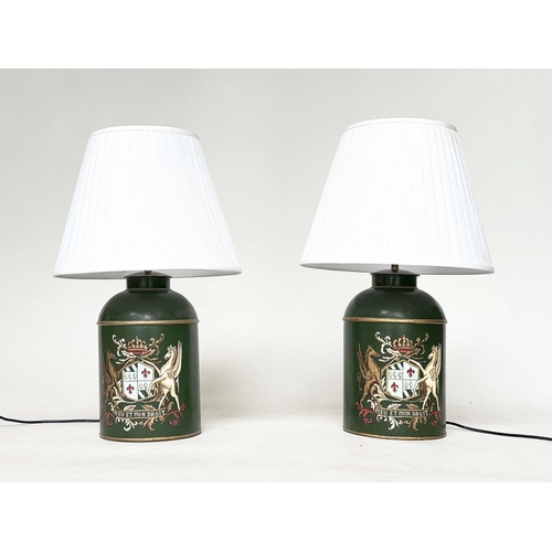 139 - TEA CANISTER TABLE LAMPS, a pair, vintage style, dark green tôleware each with coat of arms and shad... 