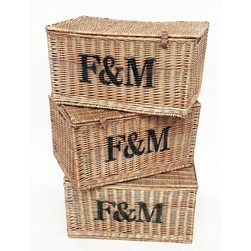 148 - FORTNUM & MASON HAMPER BASKETS, a set of three cane woven with rising lids, 76cm W x 53cm D x 41cm H... 