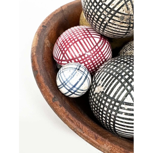 149 - CARPET BOWLS, twelve Victorian period ceramic in wooden bowl. (12)