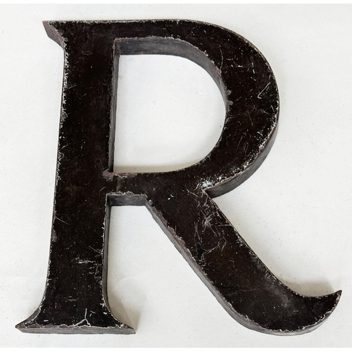 152 - LETTERS, twenty one early 20th century metal sign letters, 23cm H. (21)