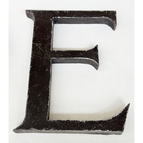 152 - LETTERS, twenty one early 20th century metal sign letters, 23cm H. (21)