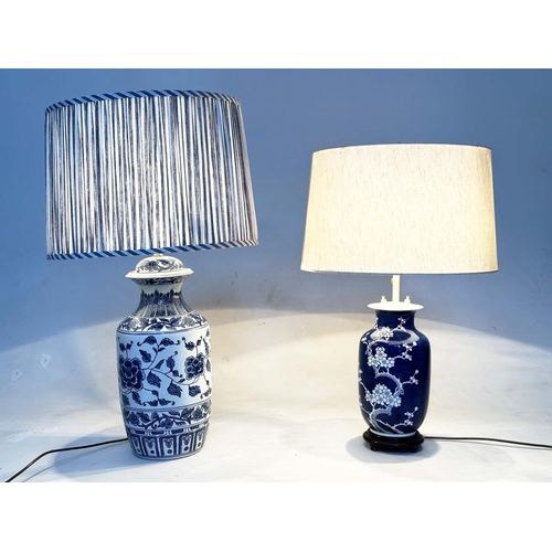 154 - TABLE LAMPS, two, comprising a Chinese blue and white ceramic vase form with striped shade and a vas... 