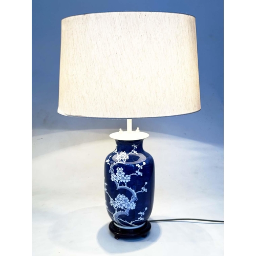 154 - TABLE LAMPS, two, comprising a Chinese blue and white ceramic vase form with striped shade and a vas... 