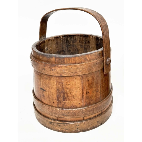 155 - RICE BUCKETS, two antique earthen varnished fir, tapering with handles, one lidded, 26cm W. (2)