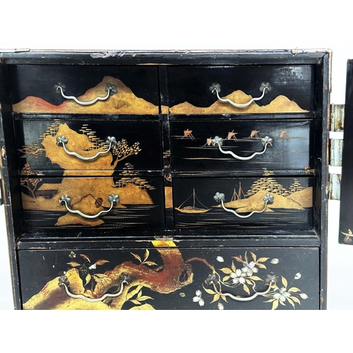 157 - 'BIRD' TABLE TOP CABINET, 19th century Chinese Quing dynasty gilt lacquered and mother of pearl inse... 