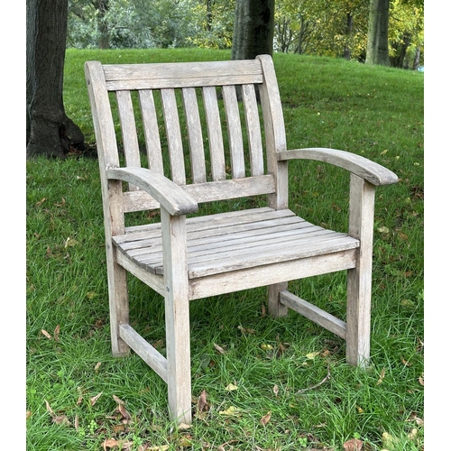 164 - GARDEN ARMCHAIRS, a pair, well weathered teak of slatted construction with curved arms, 68cm W. (2)