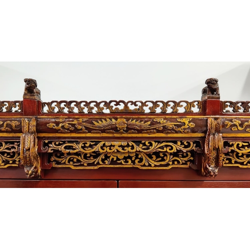 167 - CHINESE MARRIAGE CABINET, 101cm x 70cm D x 180cm H, red lacquer with carved and gilded fretwork deta... 