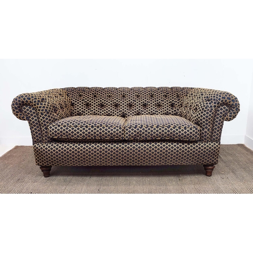 169 - CHESTERFIELD SOFA, patterned upholstery with two seat cushions on turned feet, 75cm H x 185cm W x 10... 