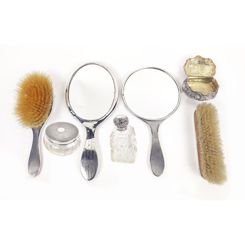 2 - SILVER DRESSING TABLE SET, four piece a silver hand mirror cut glass perfume bottle, covered jar and... 