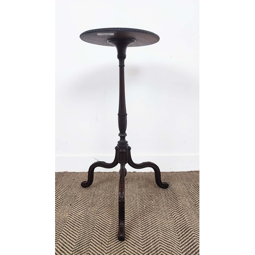 213 - CANDLE STAND, circa 1900, mahogany, an oval top with carved detail to edge, on a reeded column with ... 