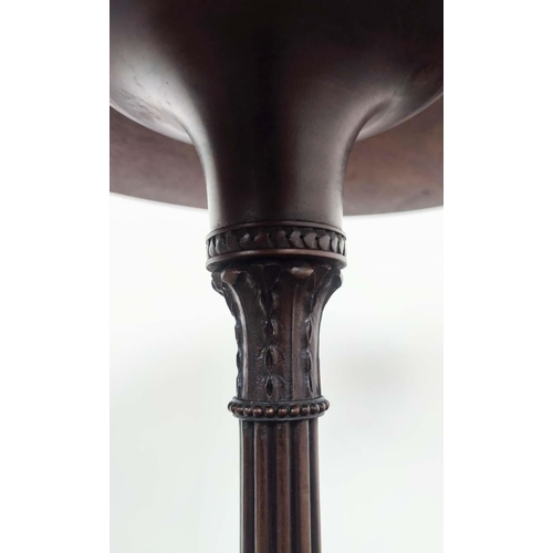 213 - CANDLE STAND, circa 1900, mahogany, an oval top with carved detail to edge, on a reeded column with ... 