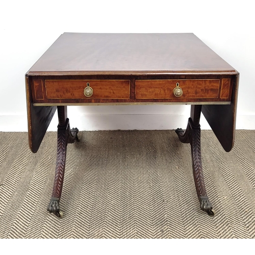 215 - SOFA TABLE, Regency plum pudding mahogany with rosewood crossbanding, with four drawers on carved su... 